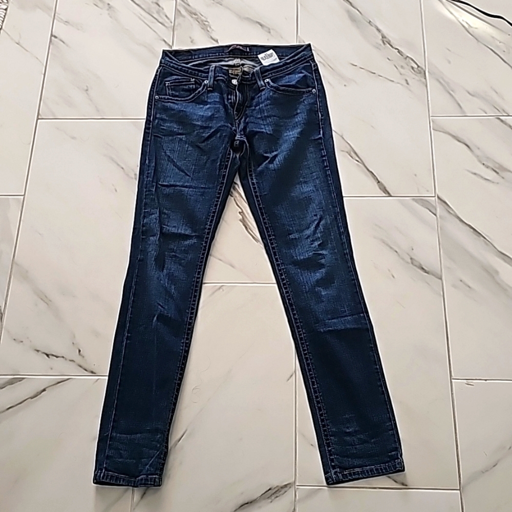Womens Levi's size 5 with stretch dark blue inseam 30 inches rise 8.2 inches